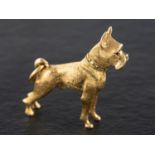 A 9ct gold Boxer charm, with hallmarks for London, 1961, total length ca. 3.2cm, total weight ca. 7.