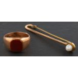 A Victorian 9ct gold carnelian signet ring and cultured pearl tie-pin,