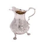 A Victorian silver cream jug, maker Robert Harper, London, 1865 initialled,