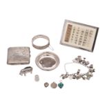 A mixed collection of various silverwares, various makers and dates includes;- charm bracelet,
