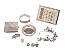 A mixed collection of various silverwares, various makers and dates includes;- charm bracelet,