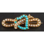 A Victorian, openwork seed pearl and turquoise 'Witch's Heart' brooch,