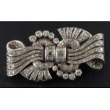 A pair of Art Deco, baguette, single and round, brilliant-cut diamond brooch clips,