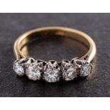 A round, brilliant-cut diamond, five-stone ring, total estimated diamond weight ca. 0.