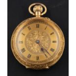 An early 20th century pocket watch, the gilt dial with engraved floral decoration,