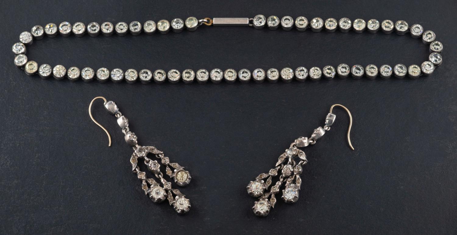 An early-mid 20th century, white paste riviere necklace and chandelier earrings,
