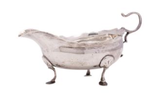 A George II silver sauce boat, maker James Crawford, Newcastle, circa 1770 with wavy edge border,