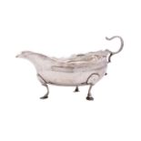 A George II silver sauce boat, maker James Crawford, Newcastle, circa 1770 with wavy edge border,