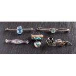 Five brooches,