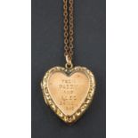 A heart-shaped locket pendant, with inscription to front, stamped '9CT', length (exl jump ring) ca.