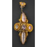 A 19th century, foil backed topaz and quartz pendant, with cannetille decoration, length ca. 5.