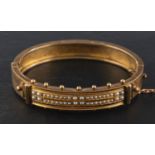 A Victorian Etruscan Revival seed pearl hinged bangle, inner length ca. 5.8cm, total weight ca.