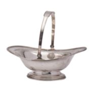 An American silver plated swing-handle bread basket of oval outline, with eagle and star medallion,
