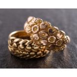 Two Edwardian, patterned, gold rings, including an 18ct gold ring of wheatsheaf design,