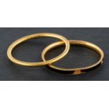 Two band rings, including a black enamel mourning ring, ring sizes M-O, total weight ca. 2.8gms.