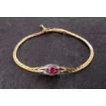 A double cobra-link, round, mixed-cut ruby and single-cut diamond bracelet,