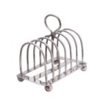 An Edward VII silver six-division toast rack, maker Mappin & Webb, Sheffield,