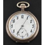 A silver keyless pocket watch the white dial with stylised Arabic numerals,