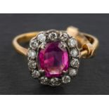 A cushion-cut pink sapphire and single-cut diamond cluster ring, estimated pink sapphire weight ca.