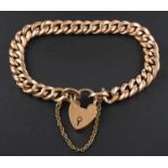 A curb-link bracelet with heart-shaped clasp, the clasp stamped '9C', length ca.