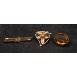 Three brooches, including an oval mixed-cut citrine brooch, estimated citrine weight ca.