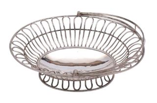 A 19th century Sheffield Plate swing-handled bread basket crested,