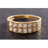 An 18ct gold, round, brilliant-cut diamond, double-row, half eternity ring,