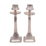 A pair of George V candlesticks, maker Charles S Green & Co, Birmingham,