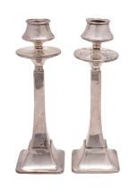 A pair of George V candlesticks, maker Charles S Green & Co, Birmingham,
