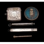 A mixed collection of silver items, including a vesta case,