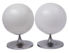 A pair of 1970's style globe shaped table lamps with opaque glass shades on chrome stems with