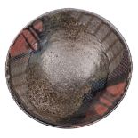 *Terri Holman [Contemporary] a stoneware bowl of shallow circular form under red and speckled