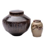 *David Leach [1911-2005] a stoneware jar and cover of shouldered form the sides with fluted