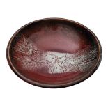 *Francois Dudouit, [Contemporary] a stoneware bowl under sang de boeuf and ivory glazes,