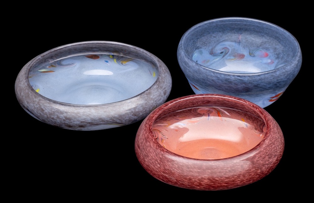 Three Strathearn glass bowls two of shallow form with inverted rims and one of ogee form decorated
