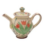 A terracotta tea pot and cover,