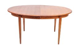 A Danish rosewood extending dining table, possibly Rosengren Hansen for Brande Mobelindustri,