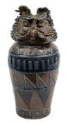 *Jennie Hale [Contemporary] a salt glazed anthropomorphic stoneware jar, with geometric decoration,