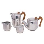 A Piquot ware metal four-piece teaset of ovoid form, includes teapot, hot water jug,