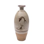 *Bernard Leach [1887-1979] a stoneware vase of slender oviform with short flaring neck three