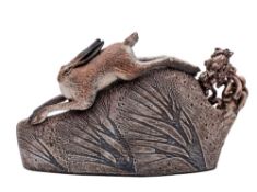 *Blandine Anderson [Contemporary] a stoneware sculpture of a running hare the hill with willow
