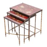 A nest of three metal and lacquered wood rectangular occasional tables,