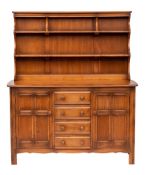 Ercol, a stained elm dresser,