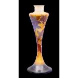 A Gallé cameo glass lamp base of slender waisted form the pale amber body overlaid with purple and