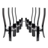A set of eight Golem dining chairs by Vico Magistretti for Poggi,