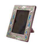 A sterling silver and enamel photo frame, stamped Sterling in the Art Nouveau taste,