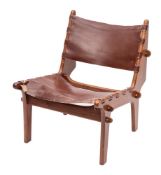 An Ecuadorian teak and maroon leather covered lounge chair, by Angel Pazmino,