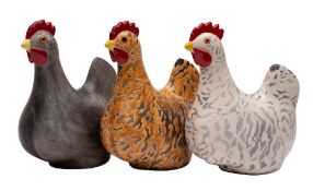 *Tony White [Contemporary] a group of three raku fired hens, impressed marks, 24cm high.