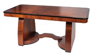 WITHDRAWN An Art Deco walnut and ebonised dining table, circa 1930,