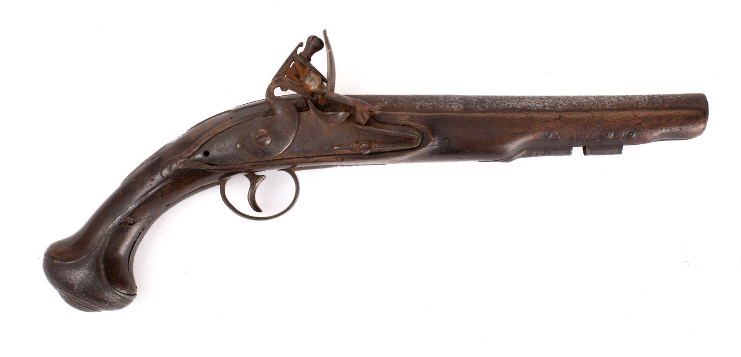 A late 18th century flintlock pistol, the plain 8 inch barrel with proof marks to chamber,
